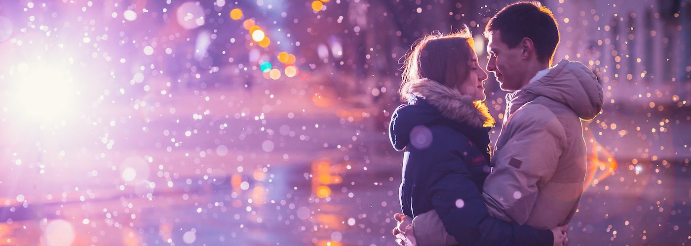 Couple embracing during winter